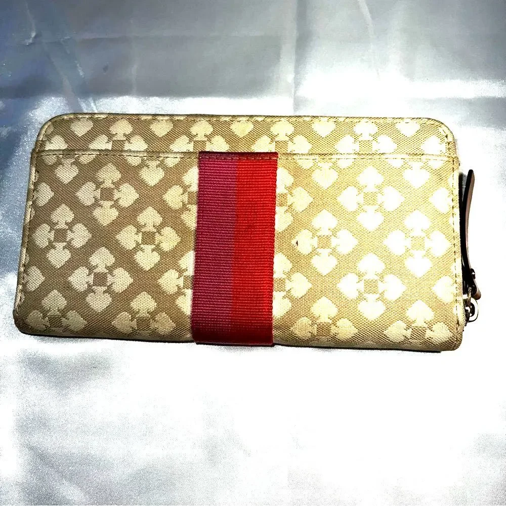 Kate Spade Neda Signature Beige and Pink Stripe Zip Around Wallet